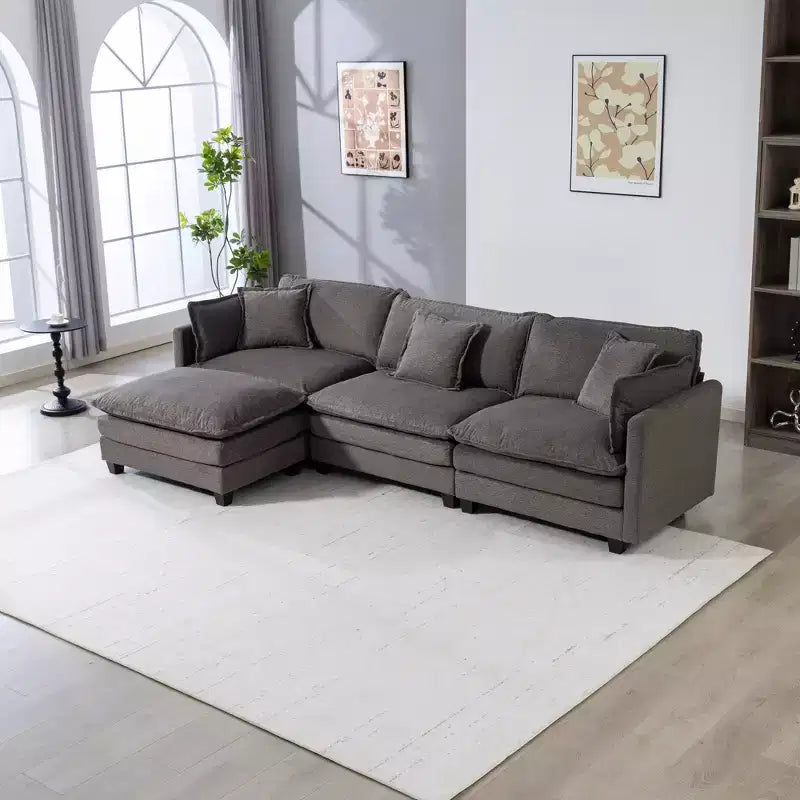 Canapé d'angle modulable 3 places GDFStudio Fairmont 113,77 en tissu chenille avec pouf et coussins lombaires
